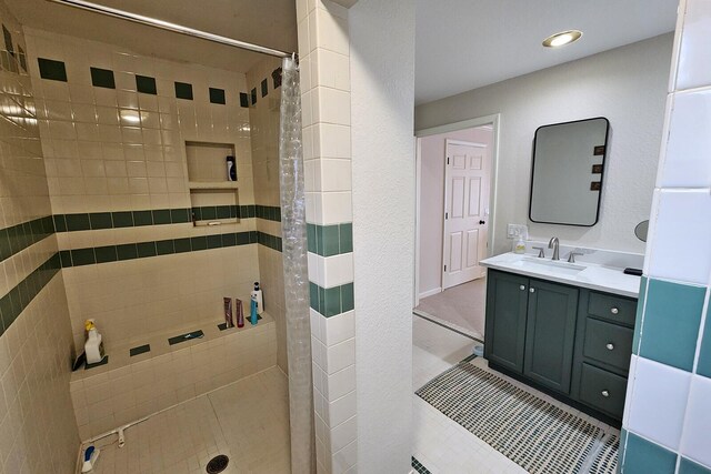 bathroom featuring vanity and walk in shower