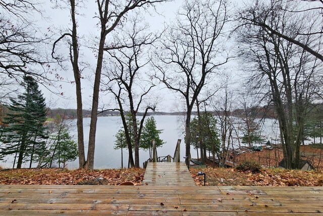 view of water feature with a dock