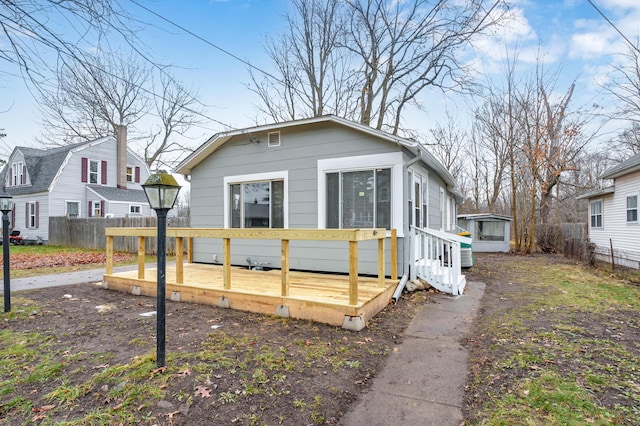 view of front of home featuring a wooden deck