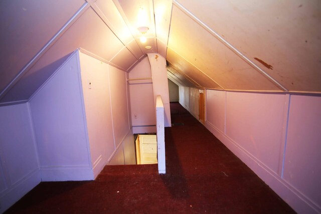 bonus room with vaulted ceiling