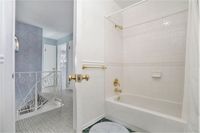 bathroom featuring tile patterned flooring and shower / tub combo with curtain