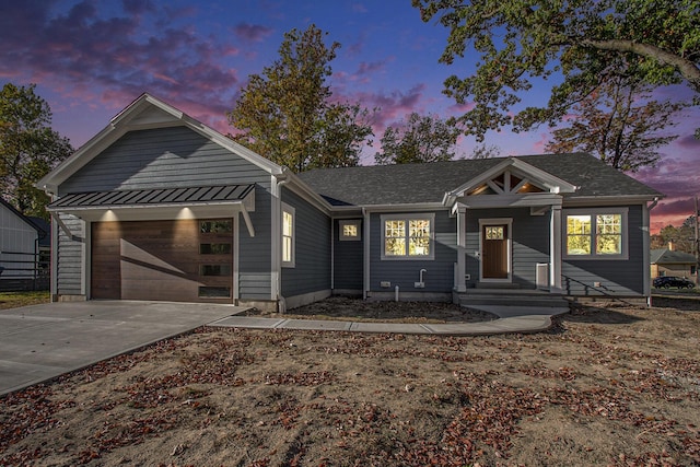 view of front of house with a garage