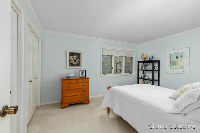 bedroom with light colored carpet, a closet, and ornamental molding