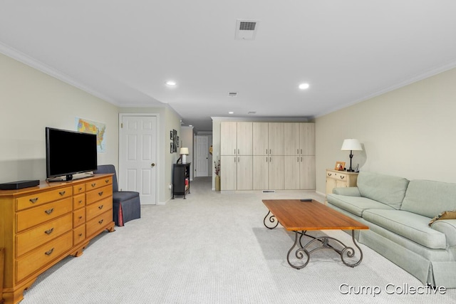 carpeted living room featuring ornamental molding