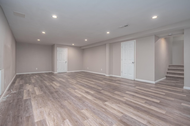 basement with light wood-type flooring