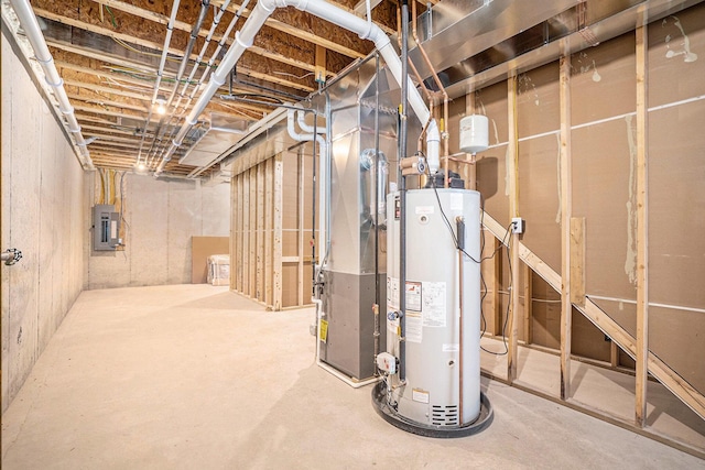 basement featuring heating unit, electric panel, and water heater