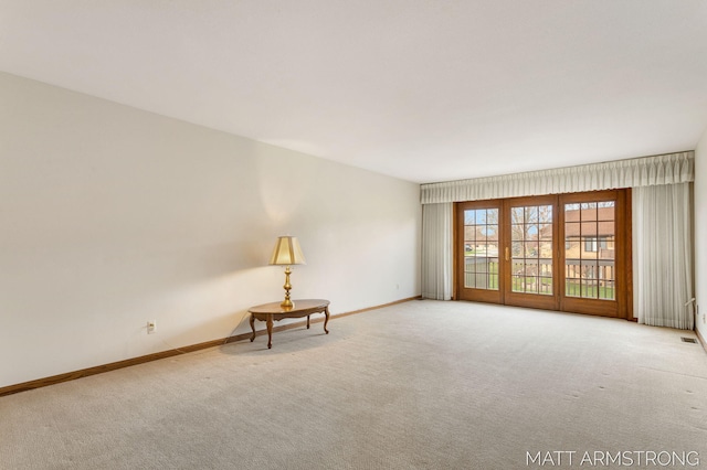 view of carpeted spare room