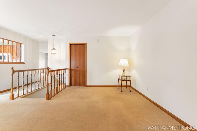 unfurnished room with carpet flooring