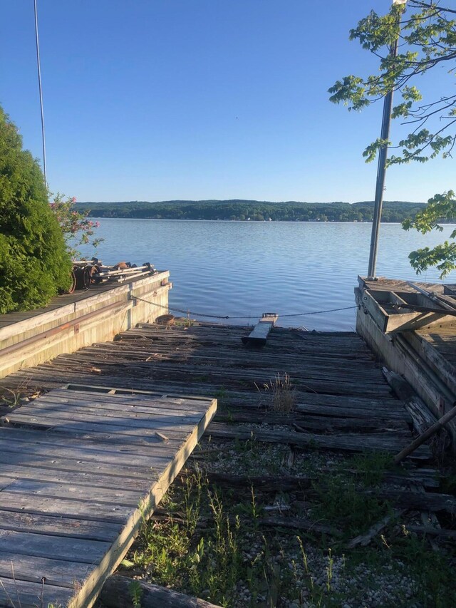 view of dock with a water view