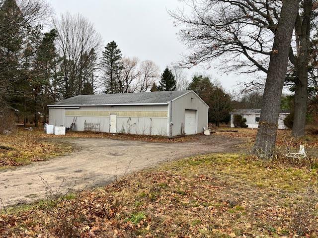 view of outbuilding featuring a garage