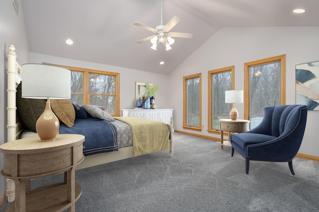 bedroom with ceiling fan, lofted ceiling, and carpet floors