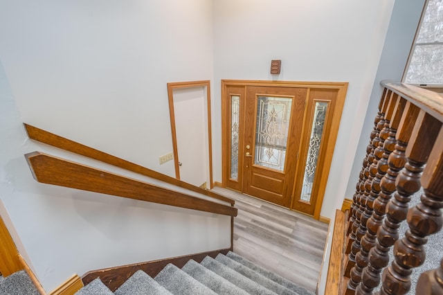 entrance foyer with light hardwood / wood-style flooring