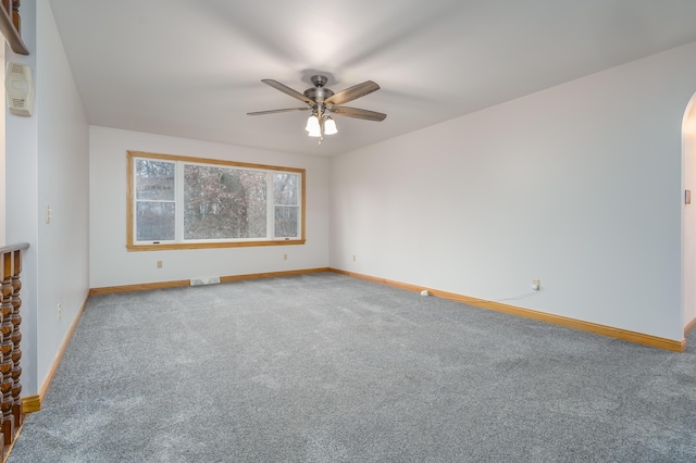 carpeted empty room with ceiling fan