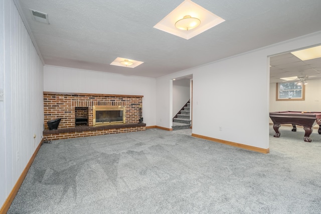 unfurnished living room featuring a fireplace, carpet, and billiards