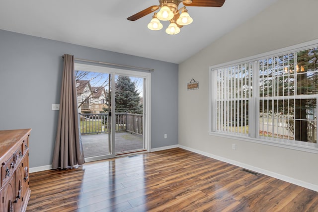 interior space featuring ceiling fan, lofted ceiling, and hardwood / wood-style flooring