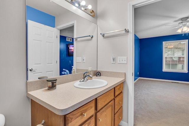 bathroom with vanity and ceiling fan