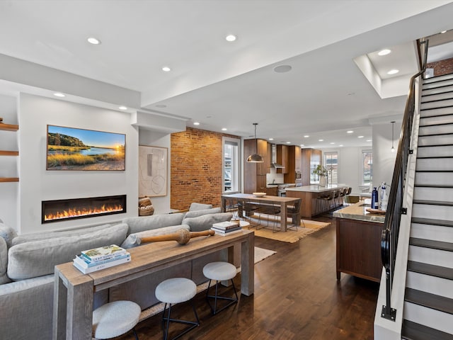 living room with dark hardwood / wood-style floors