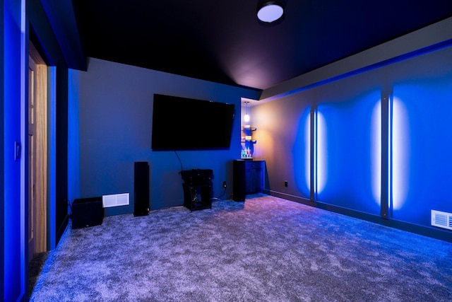 home theater room with carpet flooring