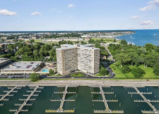 birds eye view of property with a water view