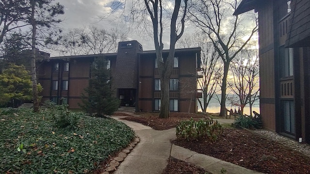 view of outdoor building at dusk