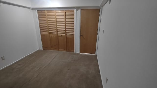 unfurnished bedroom featuring a closet