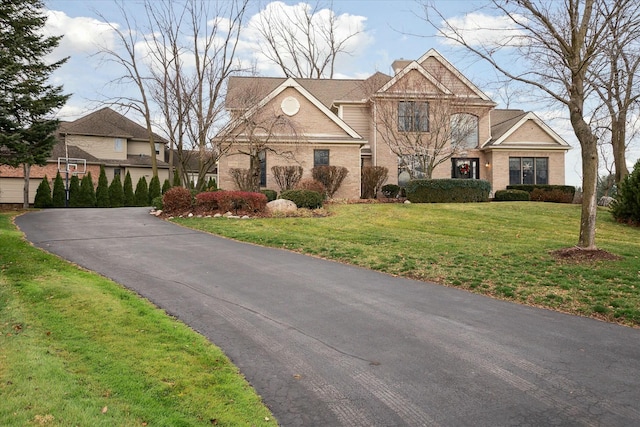 view of front facade with a front yard