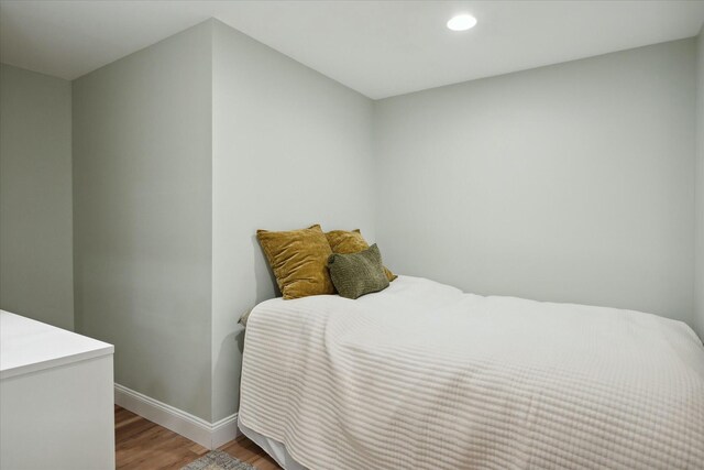 bedroom with light hardwood / wood-style flooring