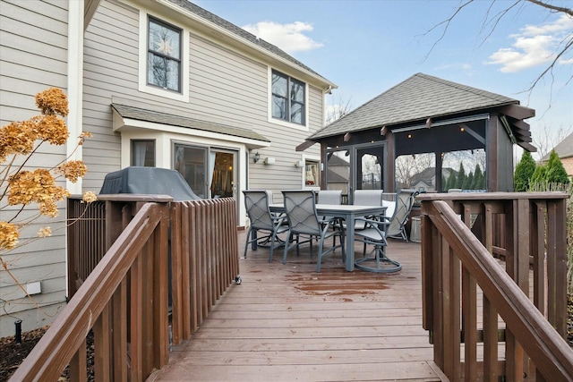 wooden terrace with a sunroom