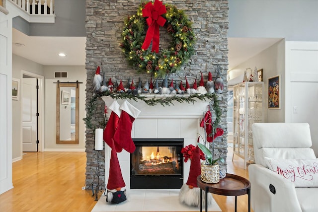 interior space featuring a fireplace and hardwood / wood-style flooring