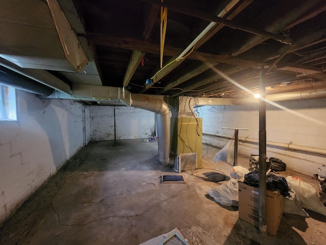 basement featuring heating unit