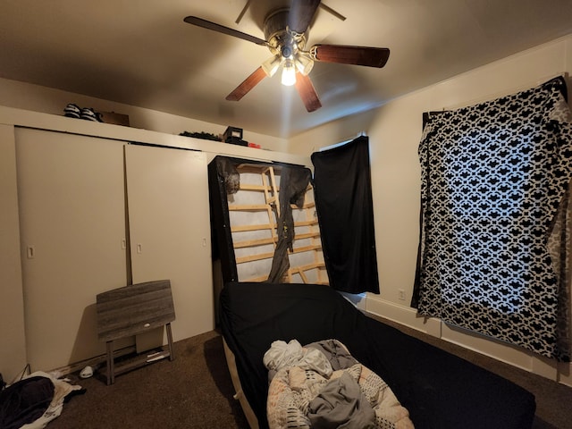 carpeted bedroom with a closet and ceiling fan