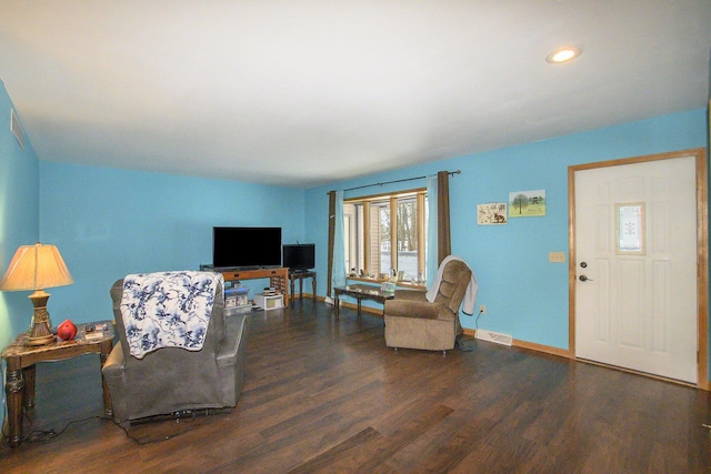 living room featuring dark wood-type flooring