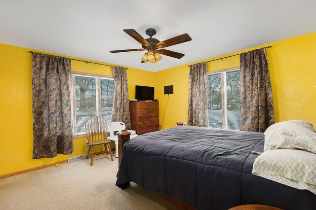 bedroom featuring carpet flooring and ceiling fan