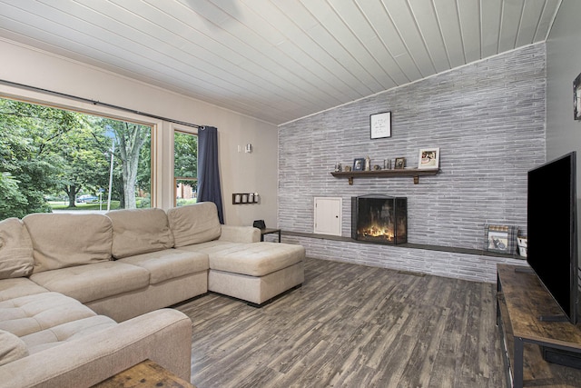 living room with hardwood / wood-style flooring, lofted ceiling, wooden ceiling, and a brick fireplace