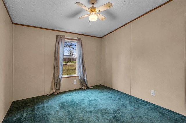 carpeted spare room with a textured ceiling, ceiling fan, and crown molding