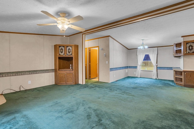 interior space with ceiling fan with notable chandelier, a textured ceiling, and ornamental molding