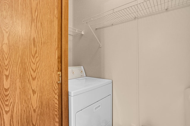 laundry room featuring washer / dryer