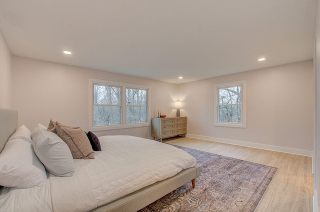 bedroom with light wood-type flooring