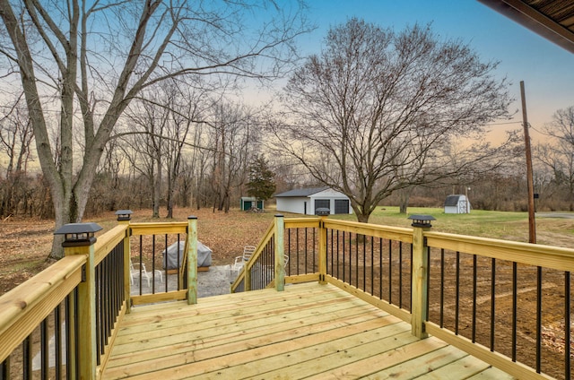 deck at dusk with a shed