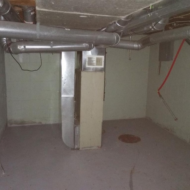 basement featuring heating unit