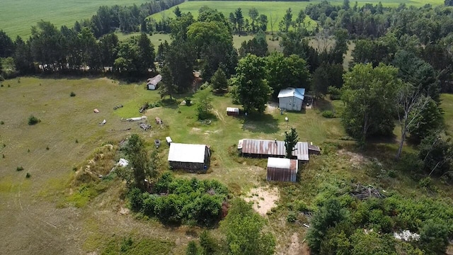 birds eye view of property featuring a rural view