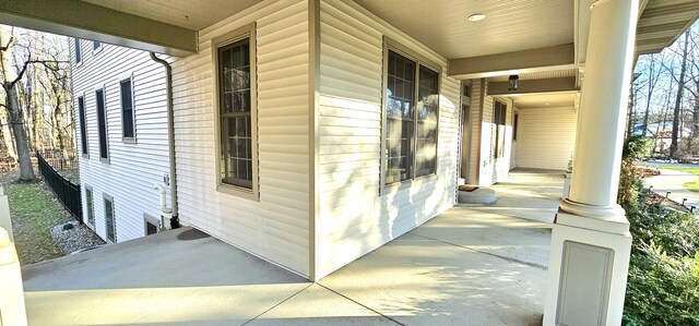 view of side of home featuring a porch