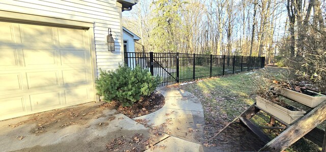 view of yard with a garage