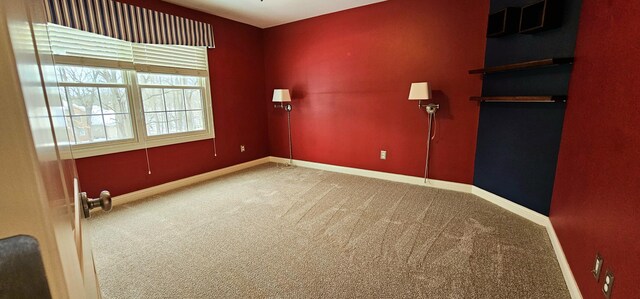 view of carpeted spare room