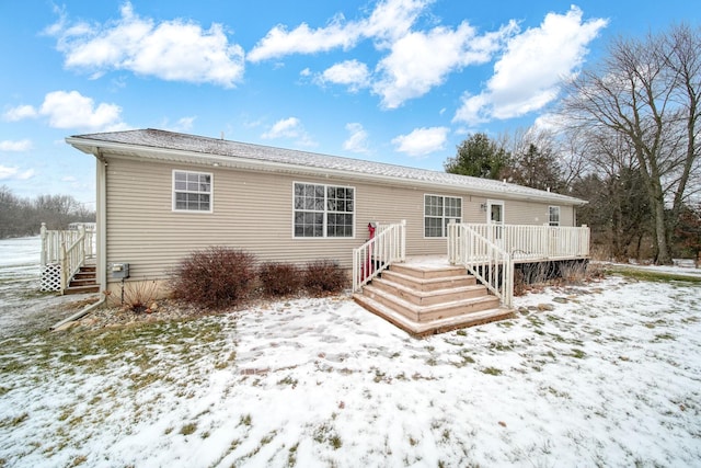 view of front of house with a wooden deck