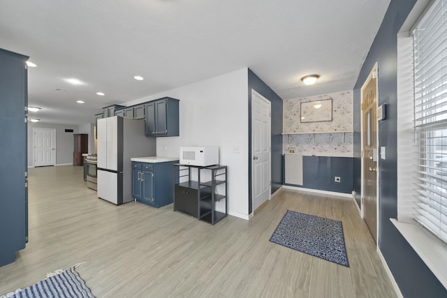 interior space with light hardwood / wood-style flooring