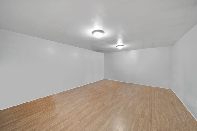 unfurnished room featuring light hardwood / wood-style flooring