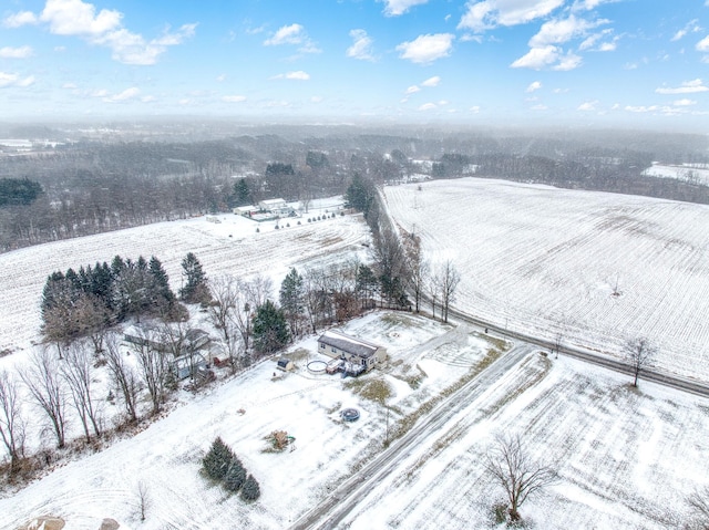 snowy aerial view with a rural view