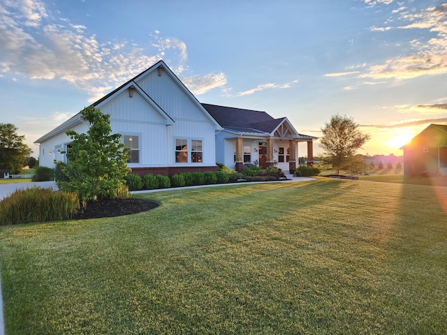 view of front of home with a yard