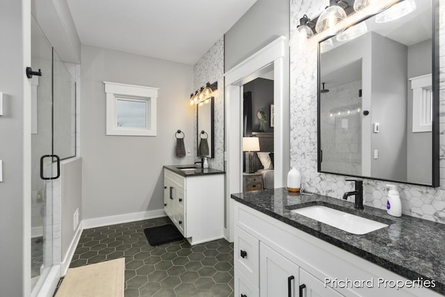 bathroom featuring tile patterned flooring, vanity, backsplash, and walk in shower